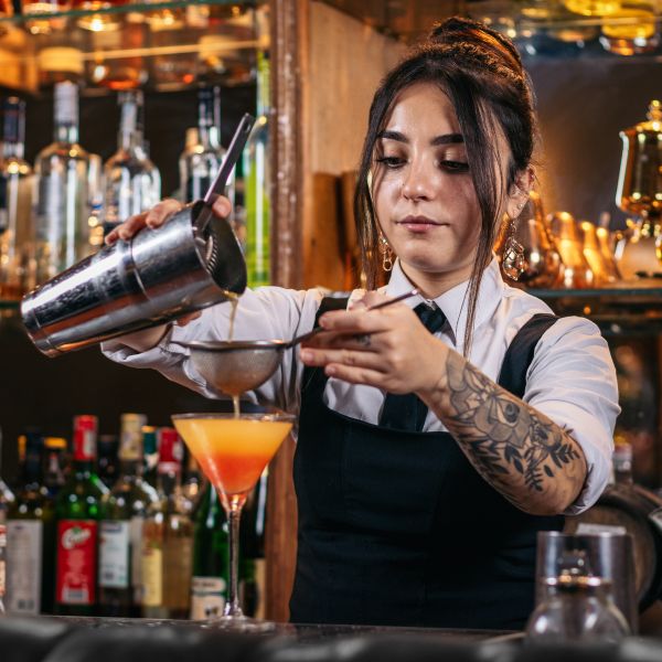 pouring a cocktail